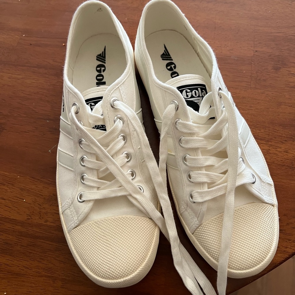 Brand new white canvas shoes.